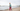 Older woman running on the beach