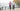 Senior couple jogging on waterfront in autumn