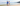 Older couple walking on the beach