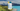 Element 12 magnesium bottle in front of nz landscape with "new" symbol 