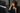 Woman touching eyes at work