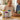 Healthy Ageing and Seep Sleep Combo Supplements on table with couple eating breakfast