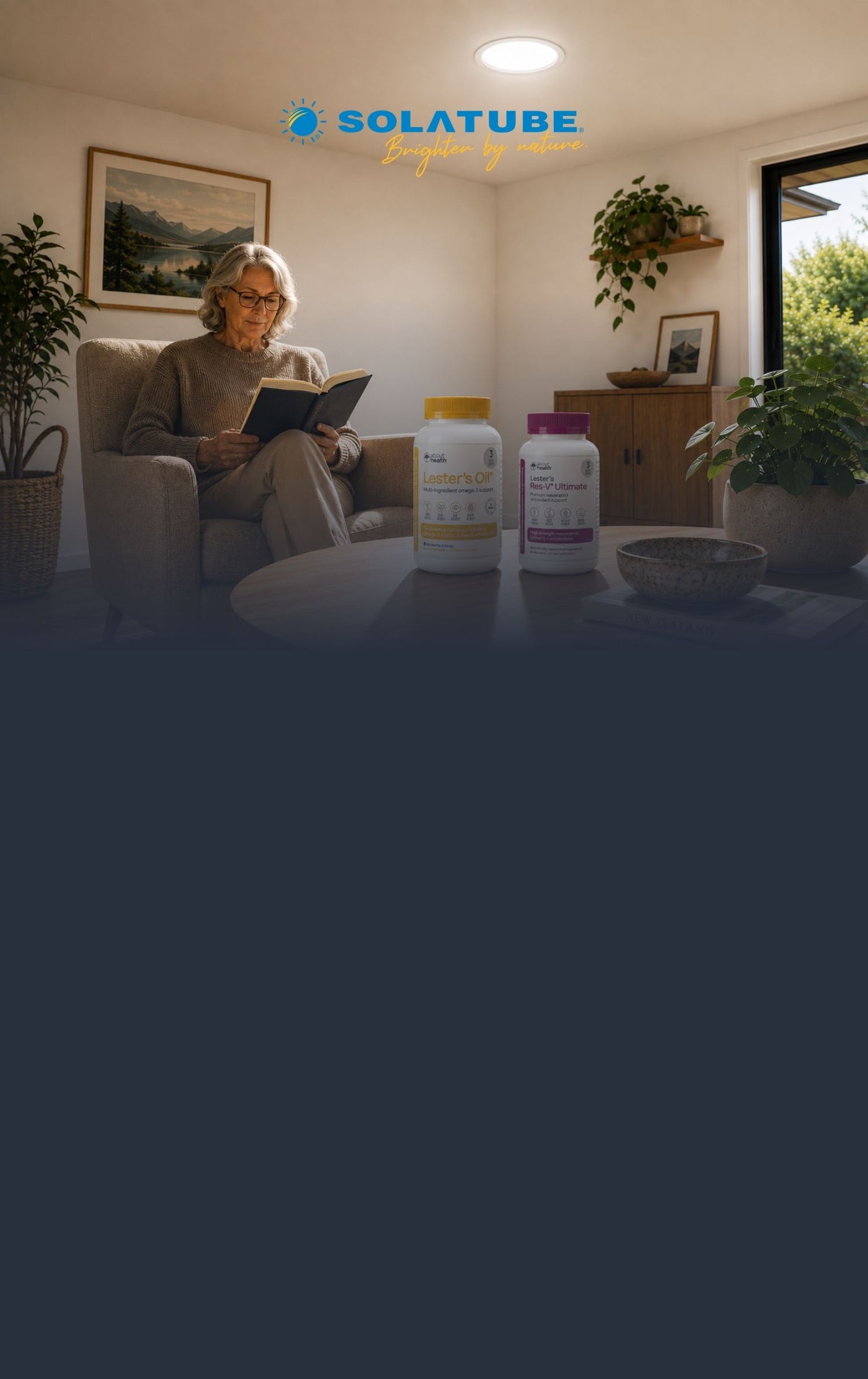 A woman sits in a beige armchair reading a book in a cozy living room, with two white supplement bottles placed on a round table in front of her. The brand name SOLATUBE is visible at the top of the image.