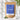 A stand-up pouch of Kiwi Nutrition Collagen powder in an unflavoured brown kraft bag with a large blue label, shown on a light marble surface with a glass of water, a spoon, and loose white powder. Text callouts on the left describe product benefits.