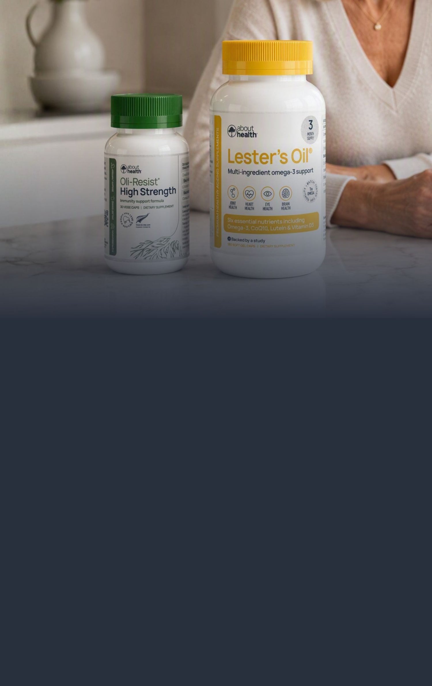 Lester's Oil and Oli-Resist on kitchen able with woman in the background