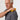 Man using the compact massage roller for shoulder tension