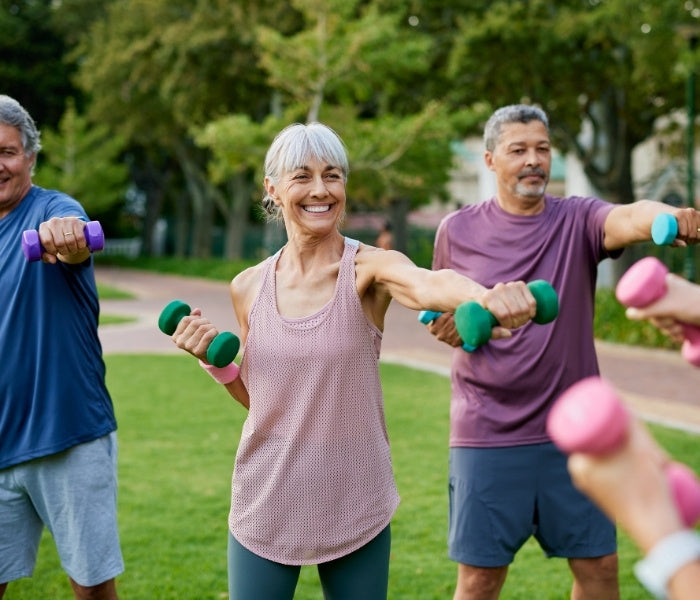 Group of elderly people exercising outside