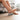 Grey foot massage roller to ease foot tension