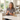 Woman in he kitchen with vanilla diffuser