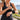 Woman running using wristband zip pocket to store energy gel